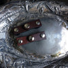 The Latch Leather Closure