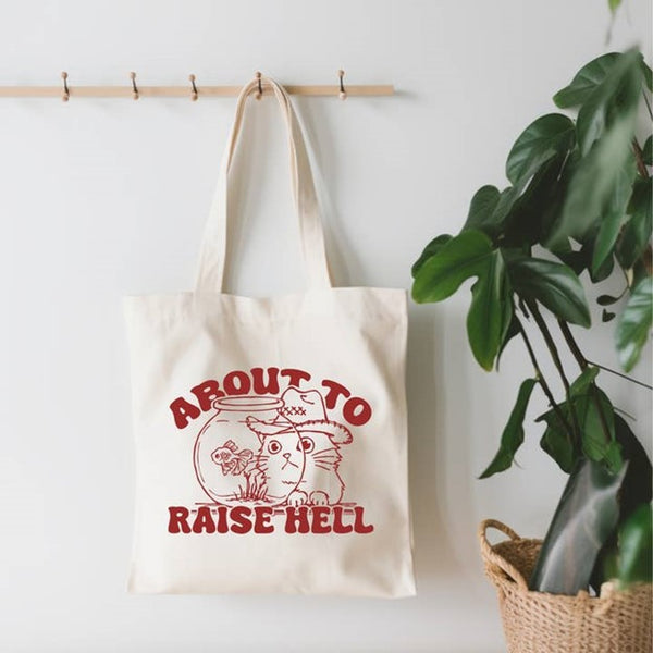 About to Raise Hell Canvas Tote Bag